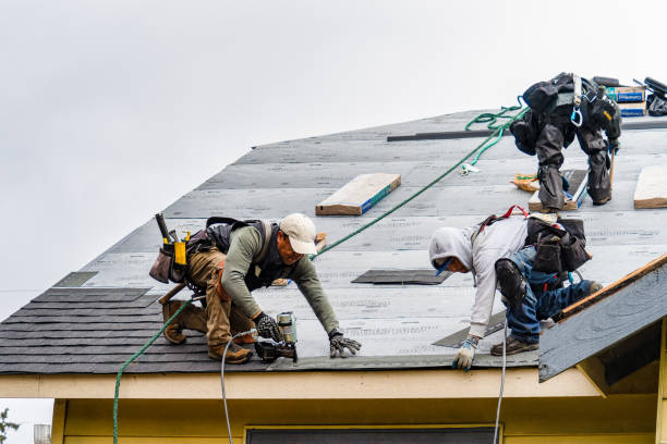Professional Roofing technician working in Helmetta, NJ